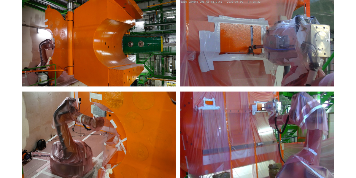 robot working on big orange structure